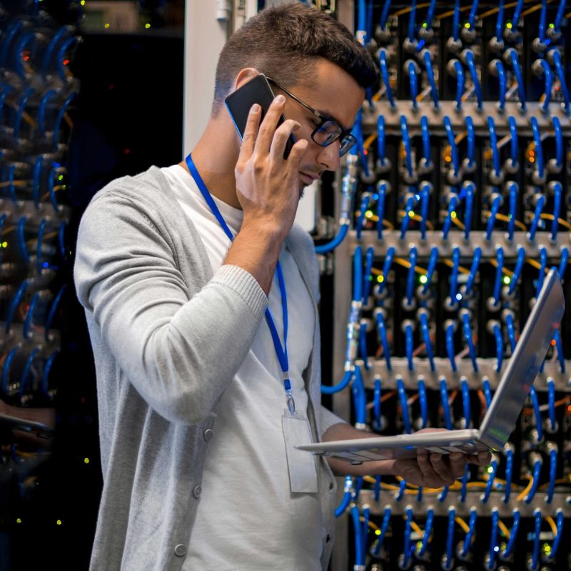 man-managing-supercomputer-via-laptop-2021-09-24-03-57-14-utc